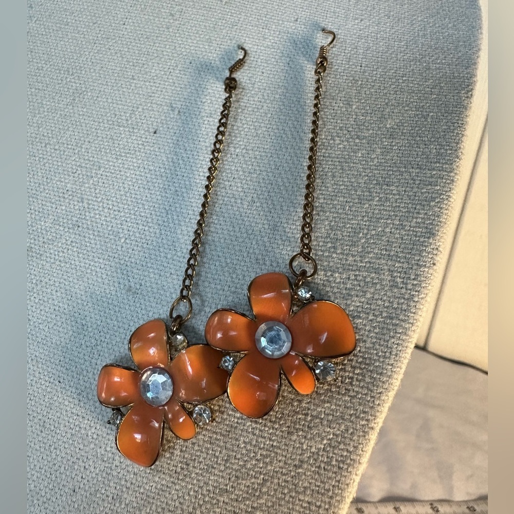 Long dangling creamsicle orange rhinestone earrings
